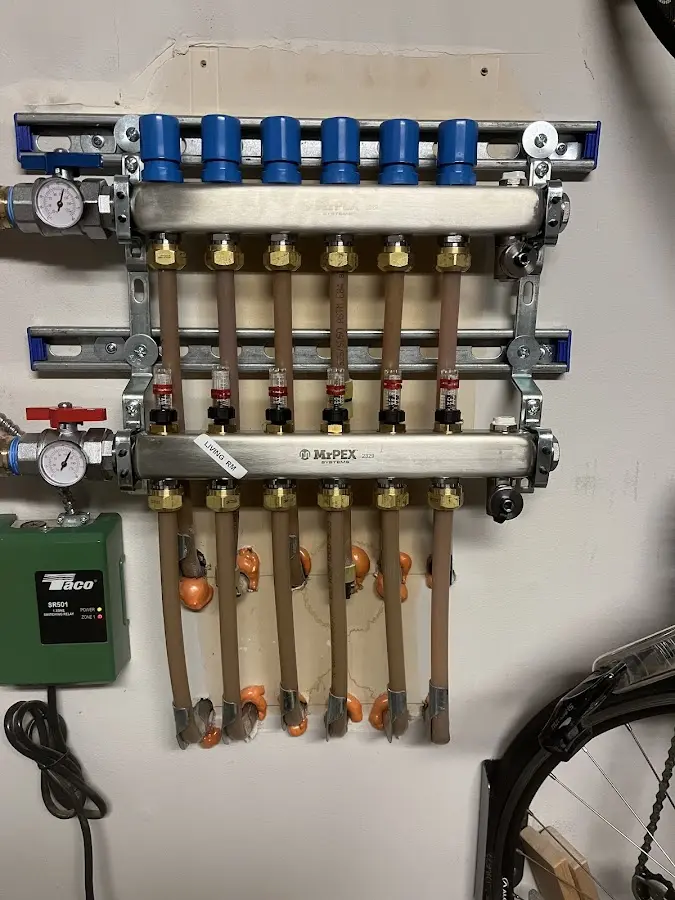 Plumber performing Gas Line Installation at a residential property in Atlanta